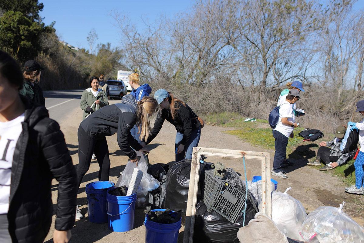 Volunteers gathering trash